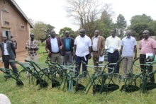 District Chairperson Ikomba Asanti Odongo talking to the farmers